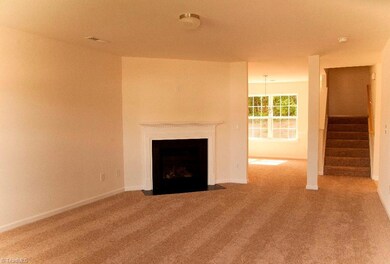 *Photo is of previously sold home. Family Room.