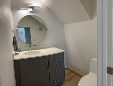 Tasteful powder room downstairs