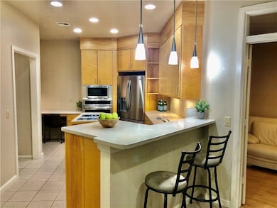 Beautiful kitchen with updated lighting & applianc