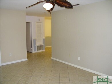 Living room looking from den