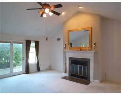 Living Room. Living room features cathedral ceilin