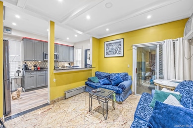 4239 Elbertson St, Elmhurst, NY 11373 - photo 2