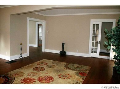 Living Room. A gorgeous french pocket door at the 