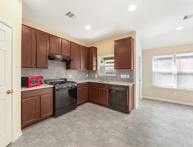 Walk-in pantry offers plenty of space.