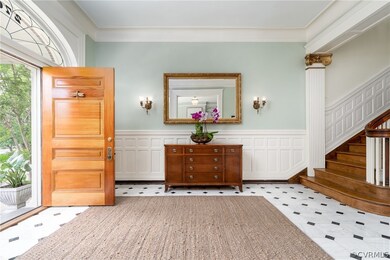 Entry Hall with beautifully patinated marble floor.