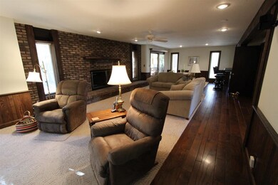 The over-sized living room could be divided into m