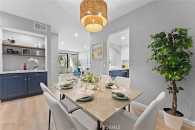 Darling dining area that feels open yet set in its own space. Converted closet into a coffee station or whatever you deem fit.