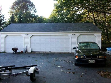 Exterior Front. 4 Bay Garage...