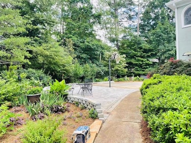 View of yard featuring view of wooded area