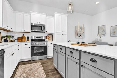 CHEFS KITCHEN! FLOATING ISLAND WITH PLENTY OF COUNTER SPACE AND CABNETS/STORAGE/ PANTRY! ALSO INCLUDES STAINLESS STEEL APPLIANCES!