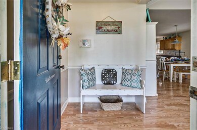 You are welcomed by a sizable entryway.