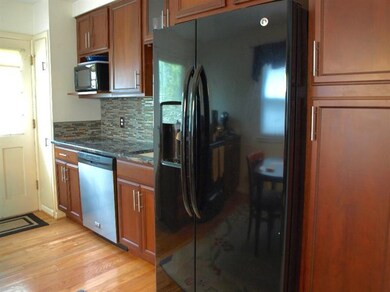 New hardwood floors and cherry cabinets