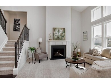 Photo is a model home photo or artist rendering due to construction stage and may be of the same model but possibly at a different location.