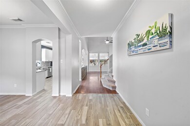 Open foyer with the dining room to the left and li