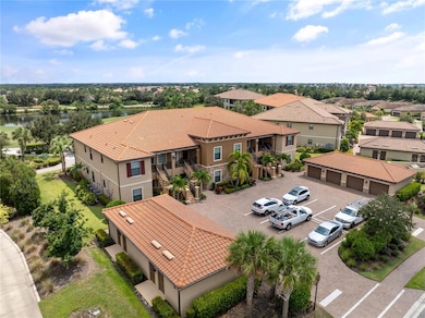 Beautifully maintained buildings and grounds... Unit 101 is the lower left end unit of the building and 1 Car Garage is the first garage in the building in the foreground