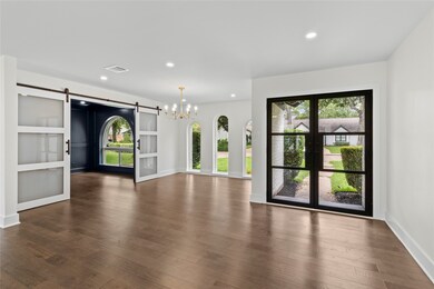 Beautifully remodeled. Note double glass doors and barn doors on office