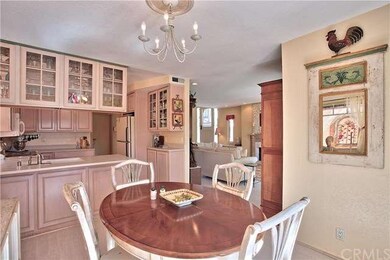 Notice the easy traffic flow  between  the kitchen