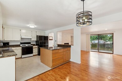 Enjoy the open spacious  kitchen layout with plenty of counter space and abundant cabinets.