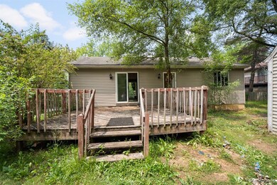Rear of Home with Deck