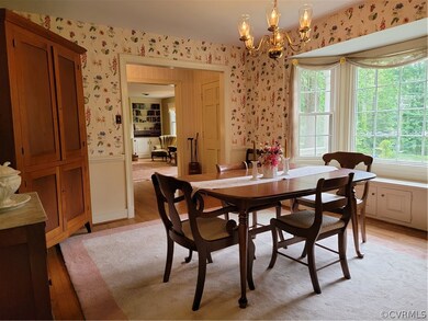 Wide cased openings from foyer to Living & Dining