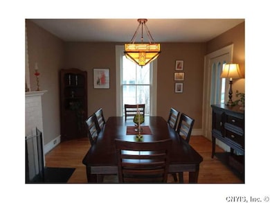 Dining Room door to right opens to side (driveway)