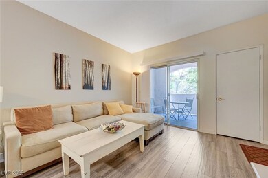 Living area with light wood-style flooring