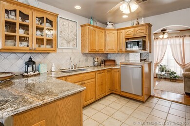 Granite countertops, tile backsplash and stainless