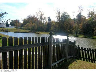 Landscaping. Fenced backyard view