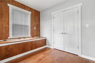 MAIN ENTRY ROOM WITH WINDOW SEAT AND LARGE CLOSET