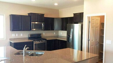 Staggered Cabinets & Walk-In Pantry