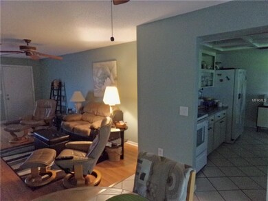 To the right of dining area is the kitchen, beyond