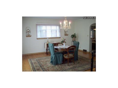 The dining room is located to the left of the foye