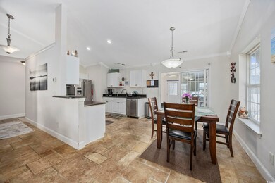 Dining area featuring a healthy amount of sunlight