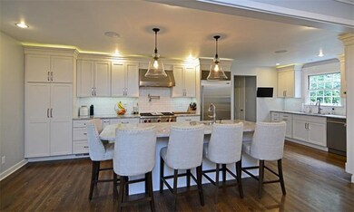 The fabulous gourmet kitchen boasts marble counter