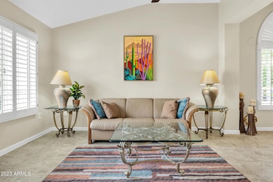 Formal Living Room With Vaulted Ceiling