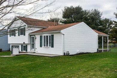 Notice the large concrete pad at the front of the home.....ideal for beautiful potted plants and a few chairs to enjoy the outdoors!