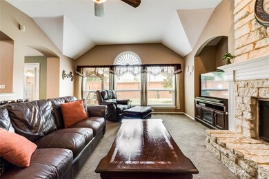 Living room with nice stone fireplace