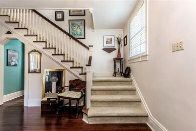 Spacious Foyer with Lovely Staircase to the Second