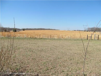 view of the fenced pasture land