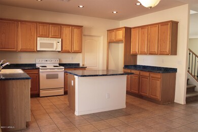 Kitchen with island breakfast bar