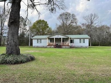 View of front of property featuring a front lawn