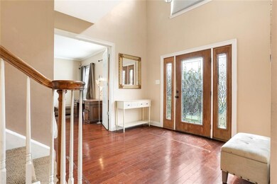 entryway with soaring ceiling