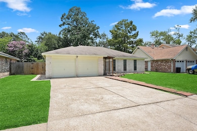 This photo shows a single-story house with a two-c