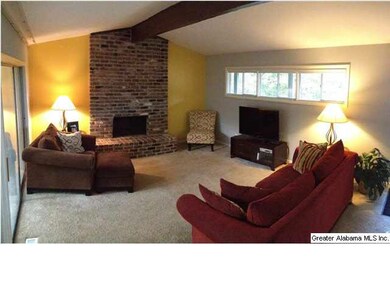 Large living room with fireplace.