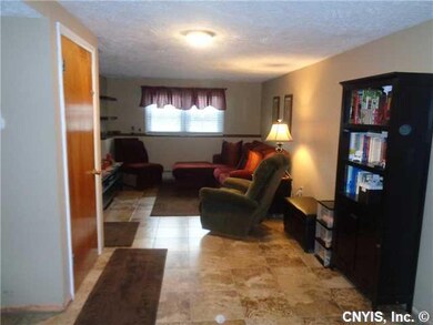 Family Room. Large Family room, door to left goes 