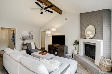 Catheral ceiling adds an airyness to the living ro