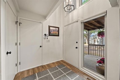 Entryway with door to garage