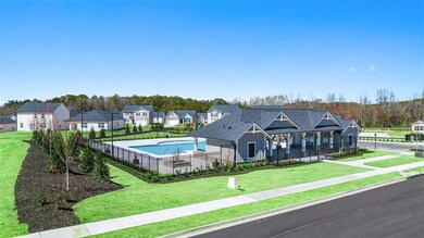 Pool with a residential view, fence, and a yard