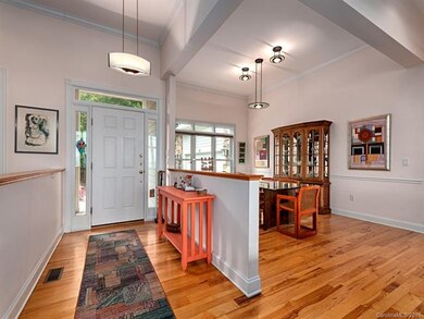 Contemporary open floor plan ..with gleaming hardw