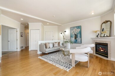 Open living area with gas fireplace